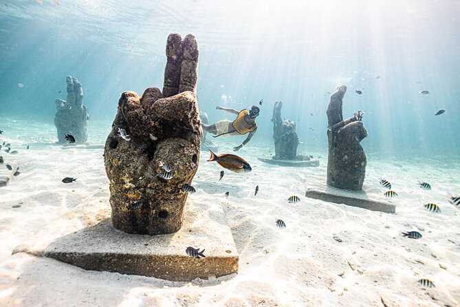 5-in-1 Cancun Snorkeling Tour with Sea Life & Transport Included - Stop 2: underwater art galleries with Blessings and Vestiges statues