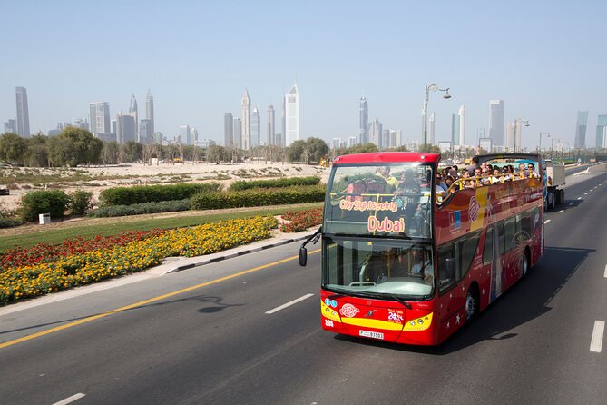 Dubai HOHO Bus Tour, Dhow Cruise & Lost Chambers Aquarium Options - Blue Route highlights: Marina, The Walk, and the Palm (Atlantis stop)